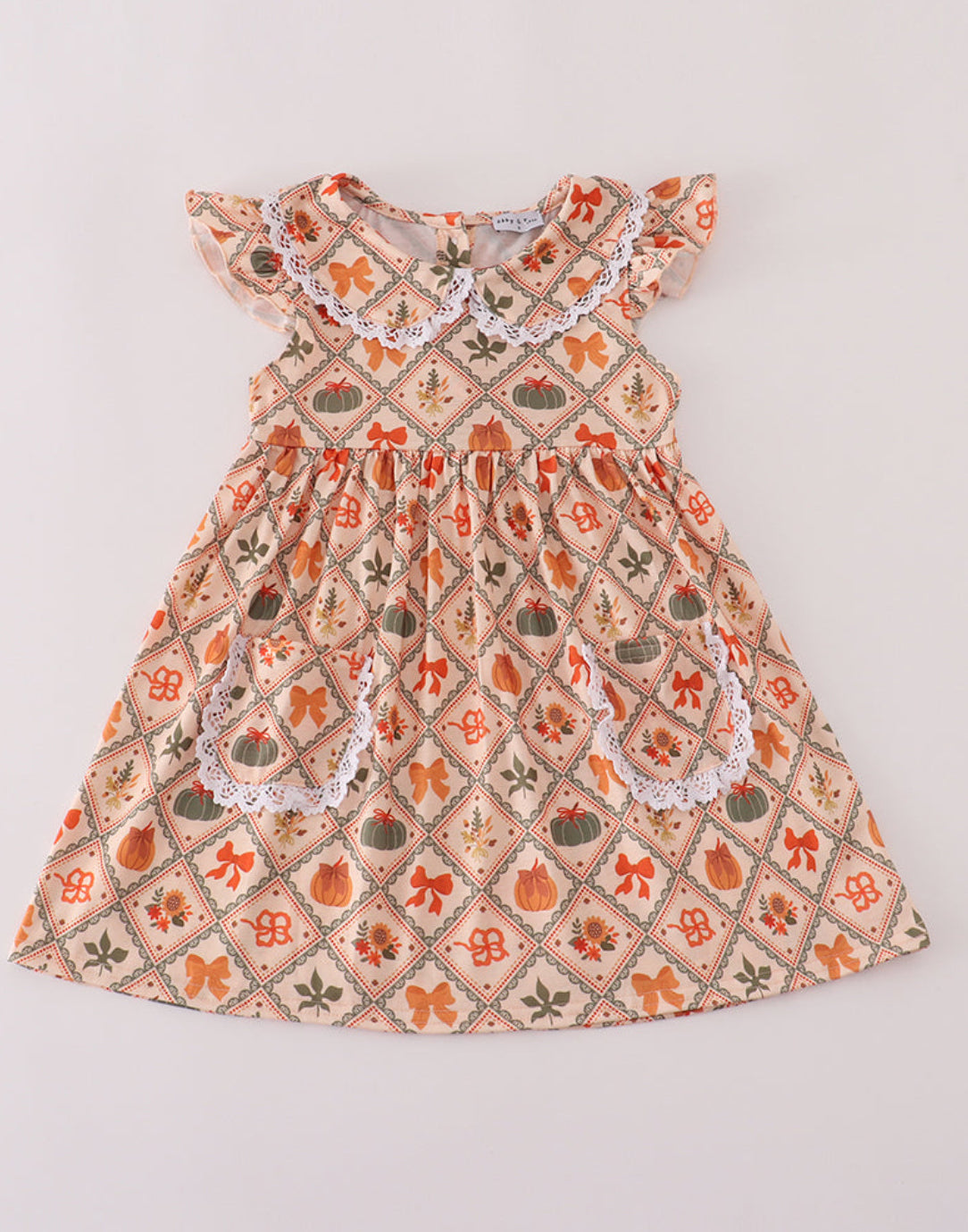 Green pumpkin bow print dress