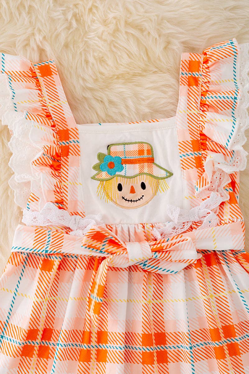 Scarecrow applique dress with embroidered hem. DRG41559 AMY