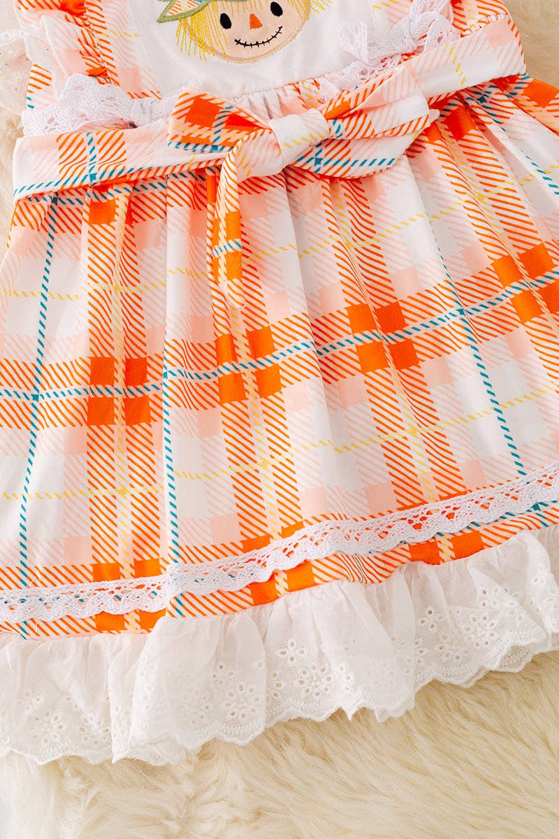 Scarecrow applique dress with embroidered hem. DRG41559 AMY