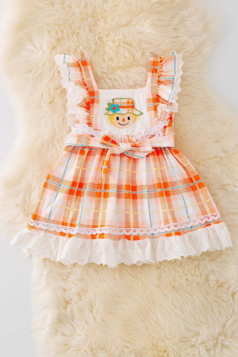 Scarecrow applique dress with embroidered hem. DRG41559 AMY